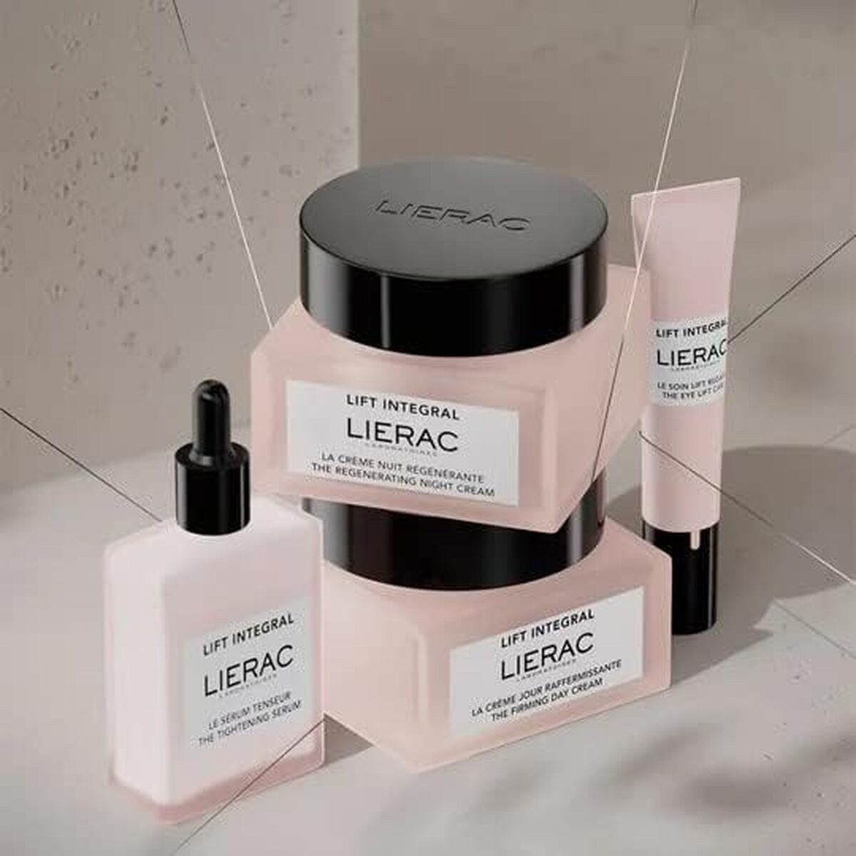 Lierac Lift Integral regenerating cream collection including night and day creams and a serum for radiant skin.